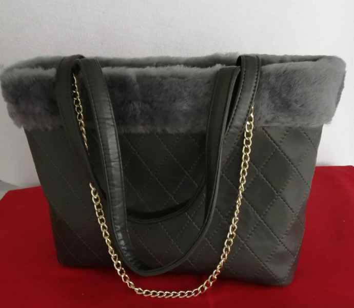 BORSA IN PELLE E MONTONE